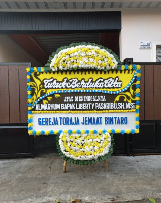 Papan Bunga Duka di Binturu